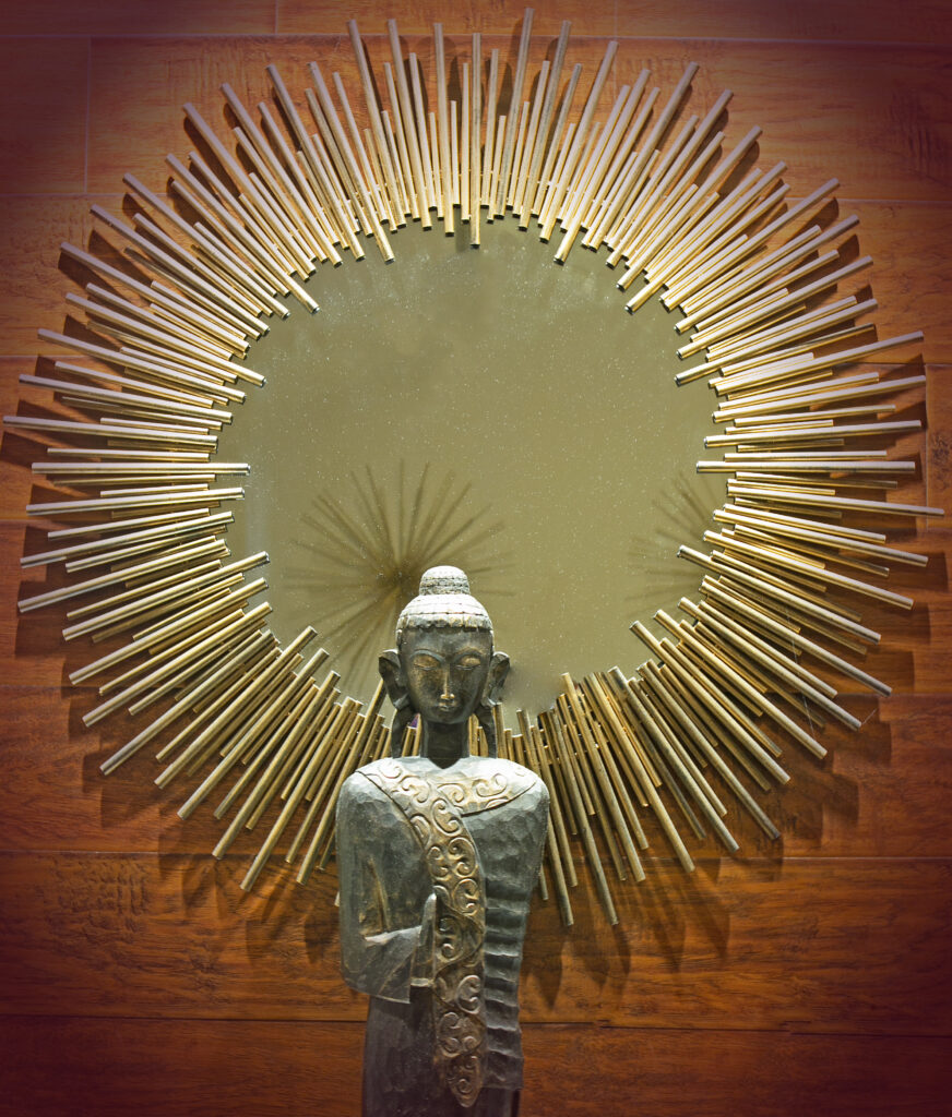 Golden sunburst Buddha statue decoration